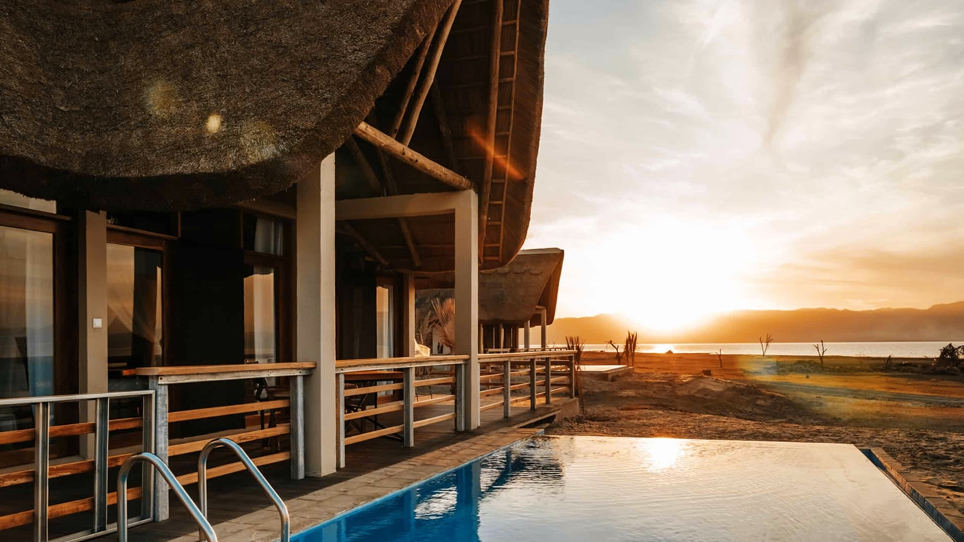 Luxury safari lodge at sunset overlooking the South African bushveld